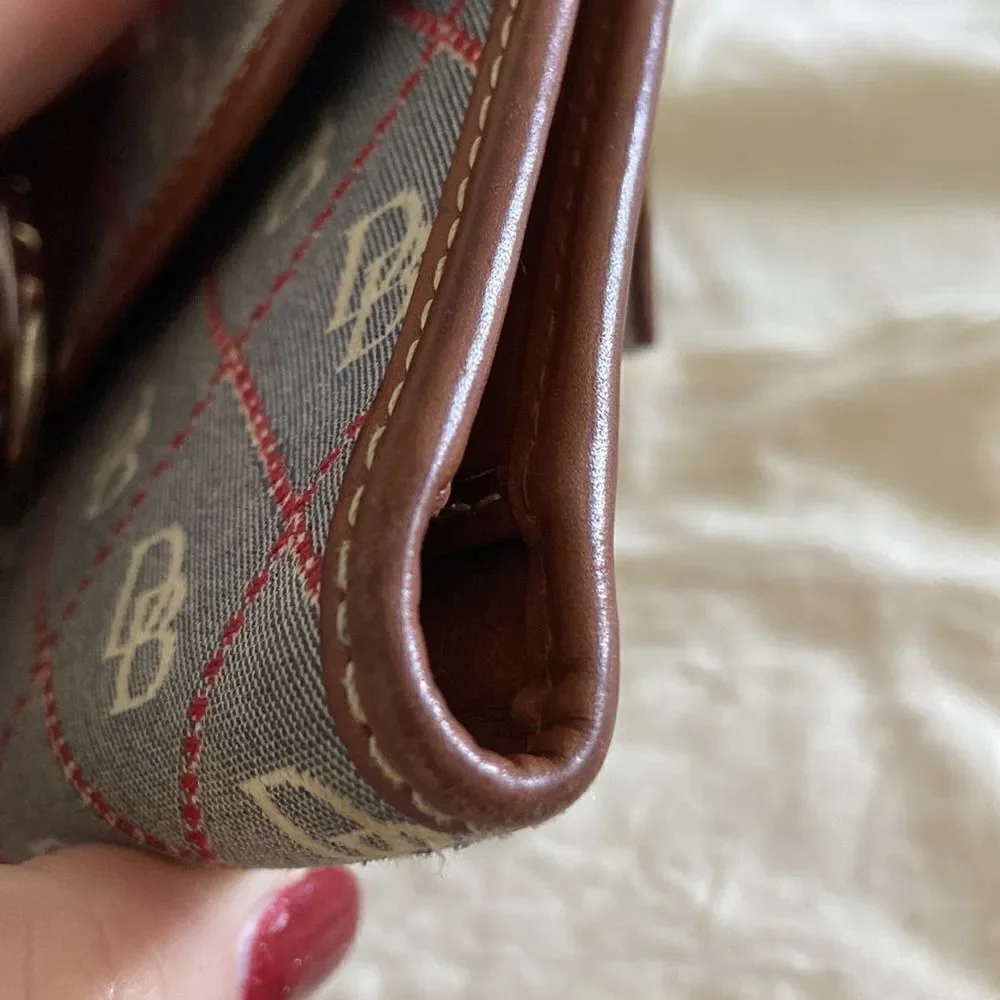 Dooney & Bourke Wallet Vintage leather clasp is silver leather imitation…
